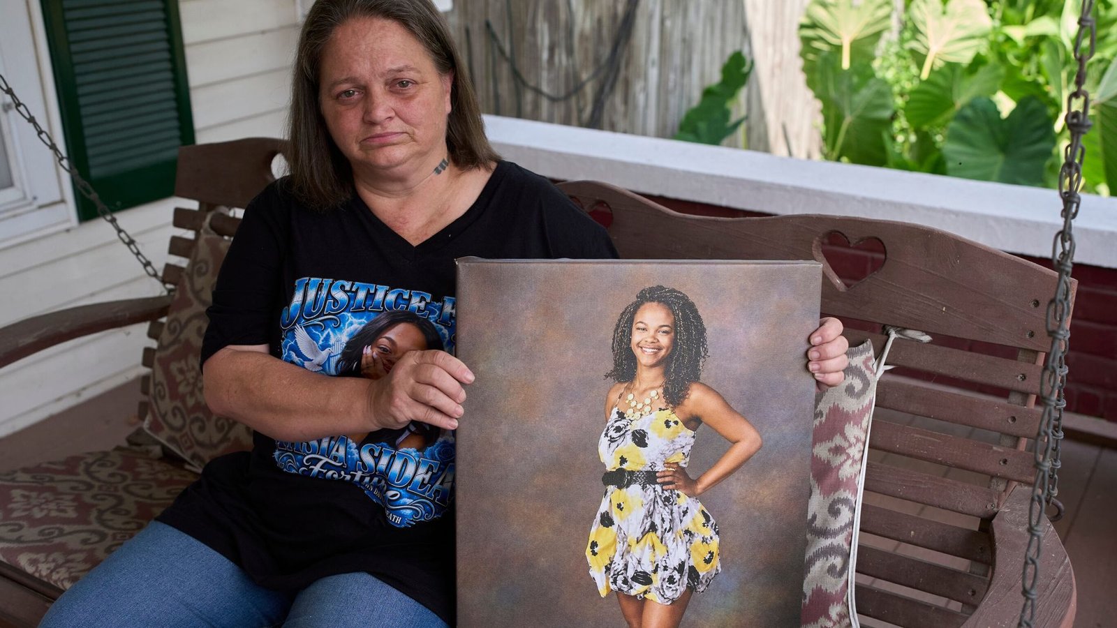 Man arrested over death of black woman found hanging from tree